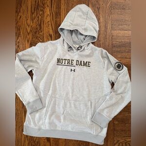 #566 NOTRE DAME (Fighting Irish) UNDER ARMOUR HOODIE. Size Medium. Like new.